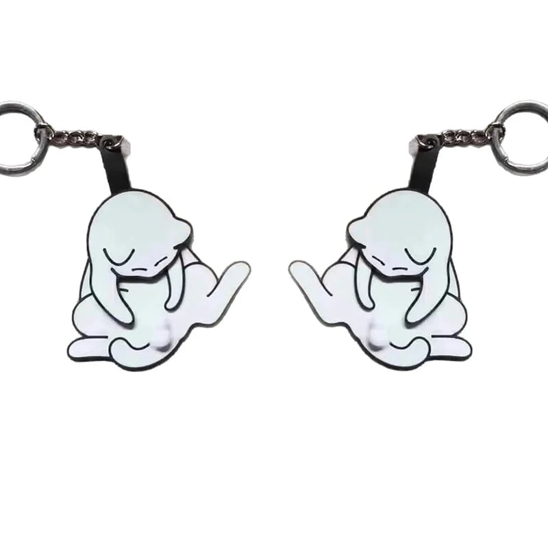 Playing with eggs and kitten keychain