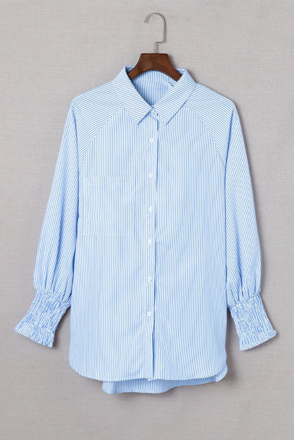 Mid-length smocked shirt with striped lapel and oversized drawdown sleeves