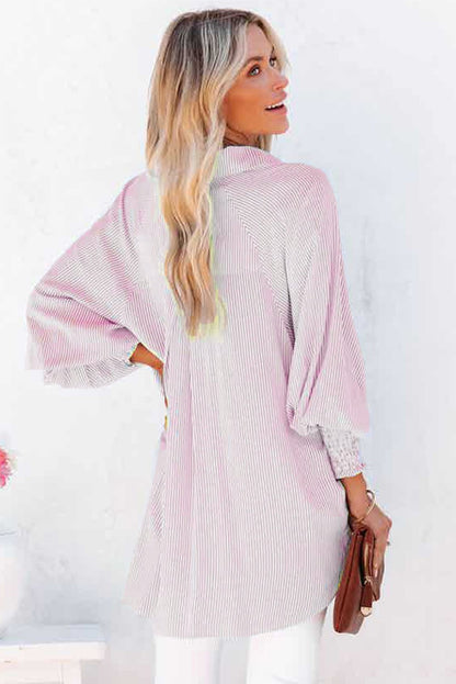 Mid-length smocked shirt with striped lapel and oversized drawdown sleeves